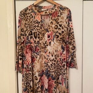 Leopard print dress with different color flowers.